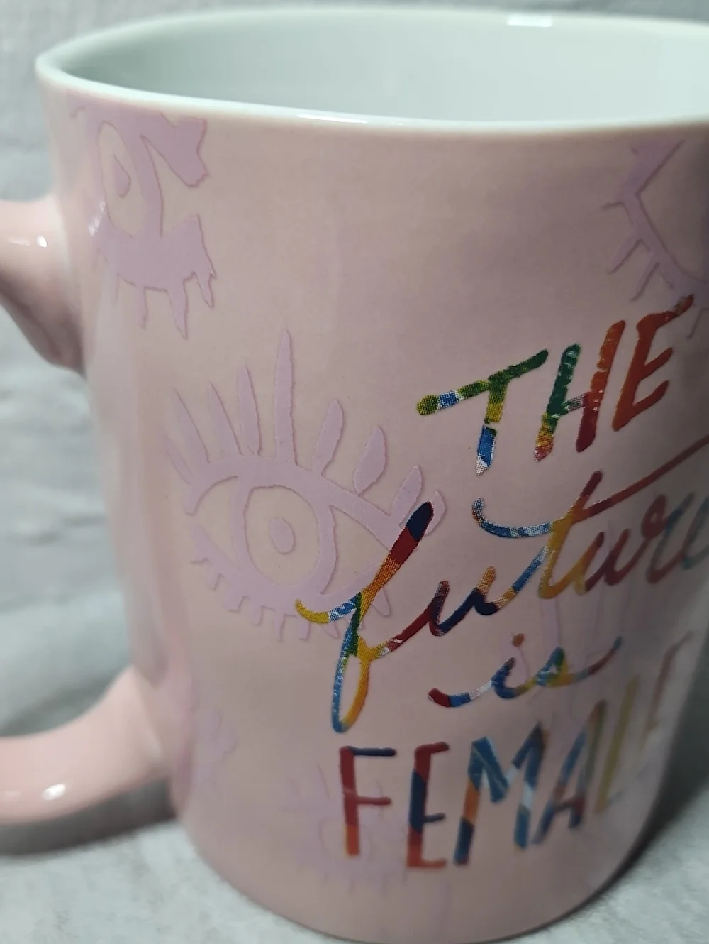 Etta Vee ceramic mug features a 